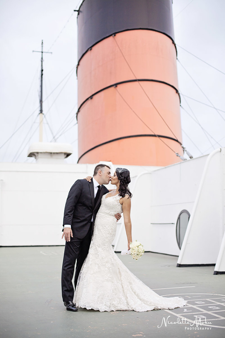 Palos Verdes wedding, glass chapel wedding, wayfarer's chapel wedding, vintage wedding, travel theme wedding, blue wedding, lace wedding gown, ivanka trump wedding shoes, queen mary wedding, queen mary grand salon wedding, san vicente park wedding portraits, beach view wedding, southern california wedding, black and white wedding photos, fun and classy wedding, lace wedding dress, hydrangea flower arrangements, unique wedding theme, southern california wedding photographer, los angeles wedding photographer, long beach wedding photographer, palos verdes wedding photographer