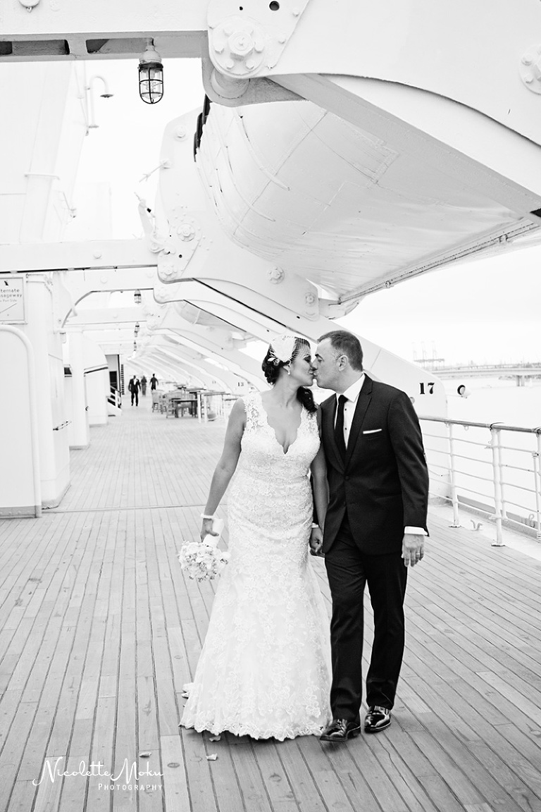 Palos Verdes wedding, glass chapel wedding, wayfarer's chapel wedding, vintage wedding, travel theme wedding, blue wedding, lace wedding gown, ivanka trump wedding shoes, queen mary wedding, queen mary grand salon wedding, san vicente park wedding portraits, beach view wedding, southern california wedding, black and white wedding photos, fun and classy wedding, lace wedding dress, hydrangea flower arrangements, unique wedding theme, southern california wedding photographer, los angeles wedding photographer, long beach wedding photographer, palos verdes wedding photographer