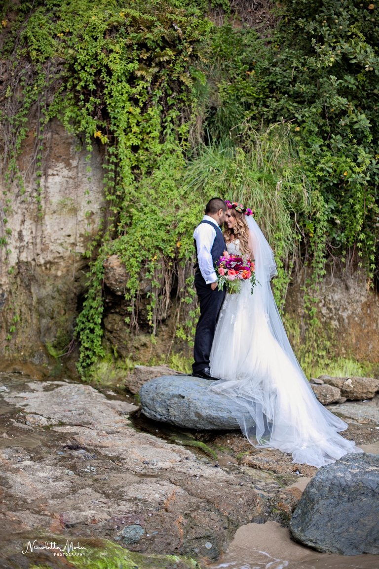 beach trash the dress, beach wedding, elaine traches, flower crown wedding photos, formal wedding portraits on the beach, laguna beach family photographer, laguna beach wedding, laguna beach wedding photographer, oc wedding photographer, orange county wedding photographer, outdoor wedding, tide pool wedding photos, trash the dress, trash the dress session, water trash the dress, wedding photos in the water, wedding photos on the beach, whimsical wedding portraits