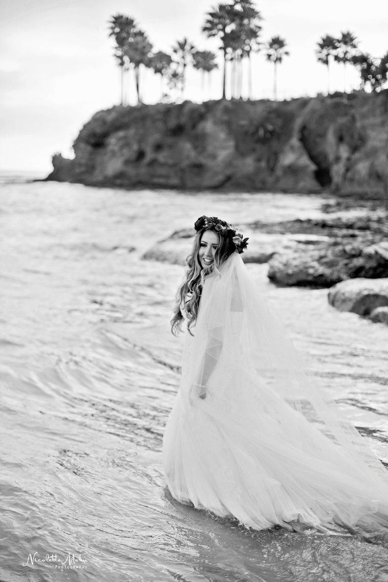 beach trash the dress, beach wedding, elaine traches, flower crown wedding photos, formal wedding portraits on the beach, laguna beach family photographer, laguna beach wedding, laguna beach wedding photographer, oc wedding photographer, orange county wedding photographer, outdoor wedding, tide pool wedding photos, trash the dress, trash the dress session, water trash the dress, wedding photos in the water, wedding photos on the beach, whimsical wedding portraits