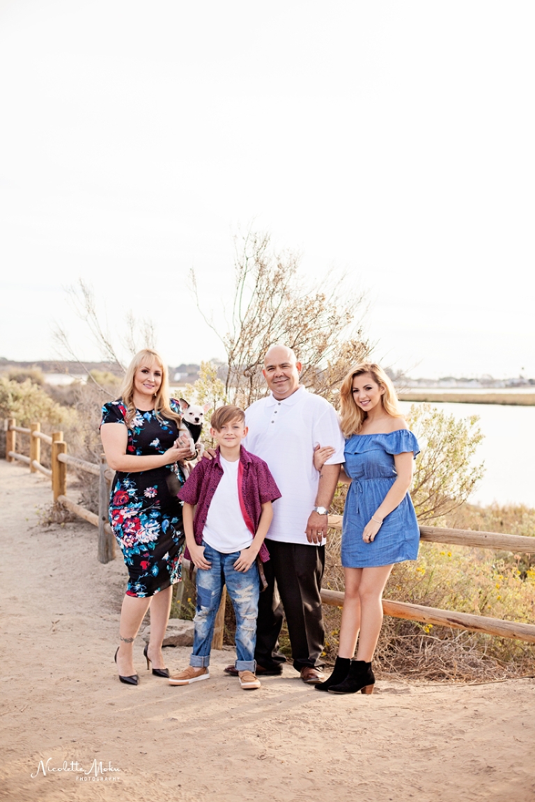 whittier family photographer, whittier photographer, newport back bay photos, newport back bay family photos, newport photographer, natural light photographer, natural light family photographer, natural light family photographer, timeliness family photos, outdoor family photos, nature family photos, family photos on a dock, sunset family photos, orange county family photos, orange county outdoor family photos