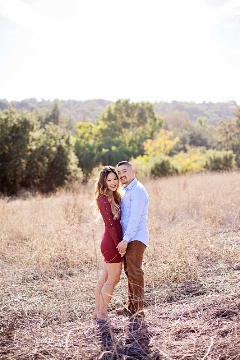 open field portraits, open field engagement session, warm sunny lit engagement, warm light photos, warm light engagement, whittier photographer, whittier engagement photographer, whittier wedding photographer, natural light photographer, lifestyle engagement photos