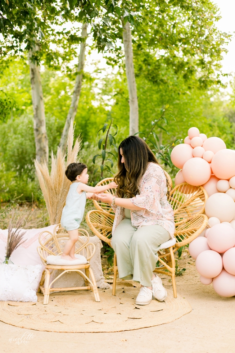 mommy and me session, spring mini session, styled spring session, outdoor family pictures, contemporary family pictures, daisy rattan chair, drea designs, balloon garland, mommy and baby photos, mothers day pictures, whittier photographer, whittier family photographer