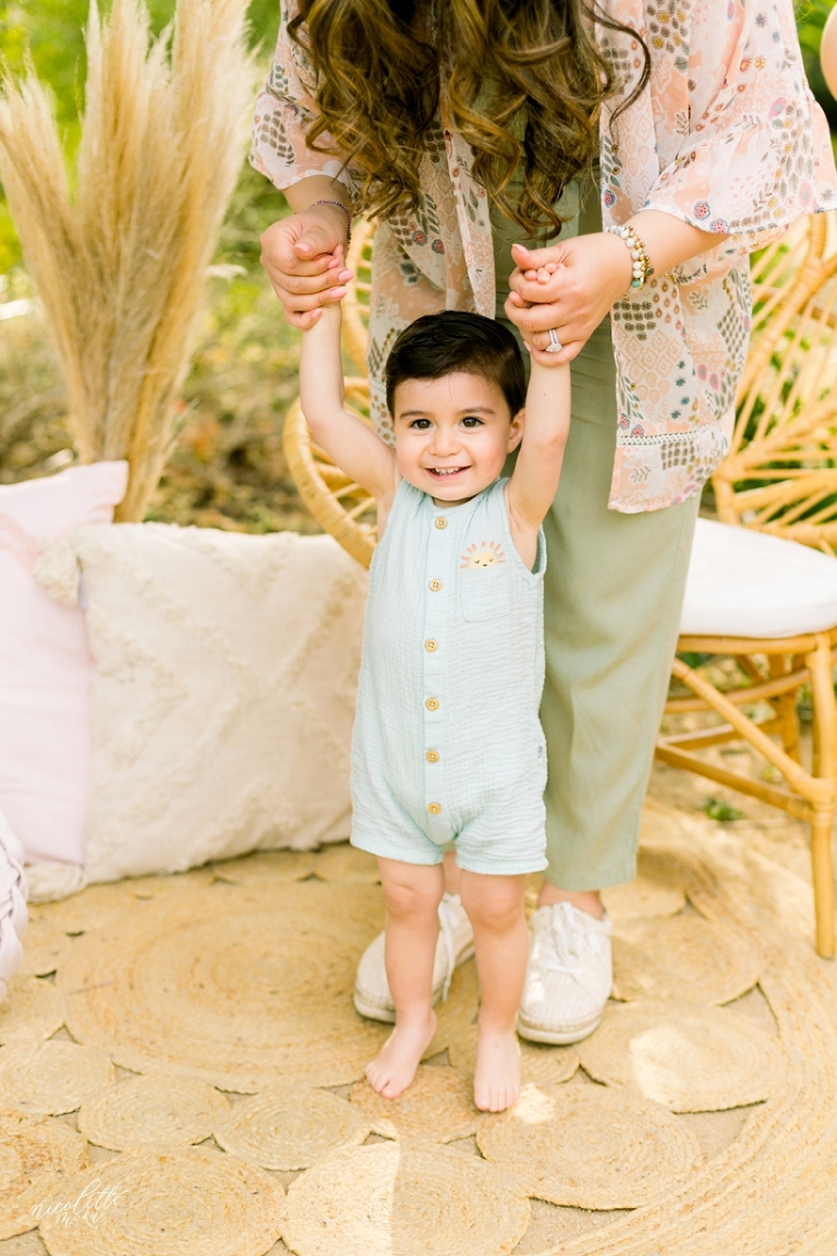 mommy and me session, spring mini session, styled spring session, outdoor family pictures, contemporary family pictures, daisy rattan chair, drea designs, balloon garland, mommy and baby photos, mothers day pictures, whittier photographer, whittier family photographer