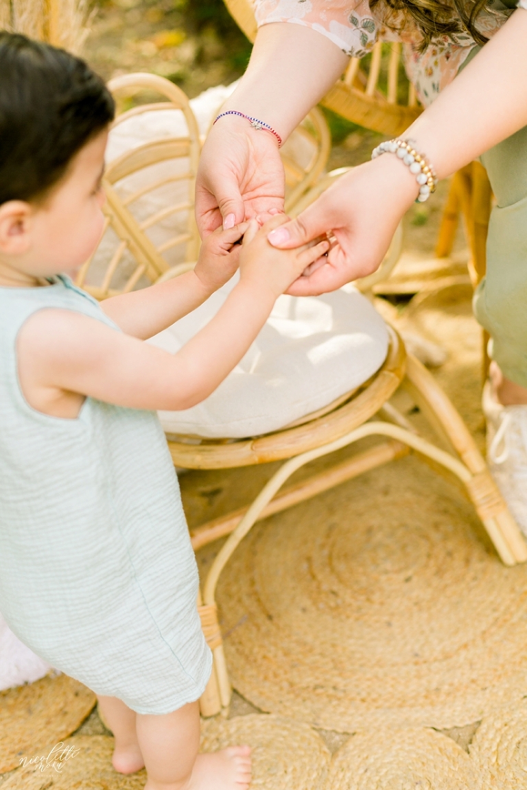 mommy and me session, spring mini session, styled spring session, outdoor family pictures, contemporary family pictures, daisy rattan chair, drea designs, balloon garland, mommy and baby photos, mothers day pictures, whittier photographer, whittier family photographer